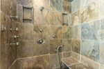 Unwind and enjoy the huge shower in the primary suite